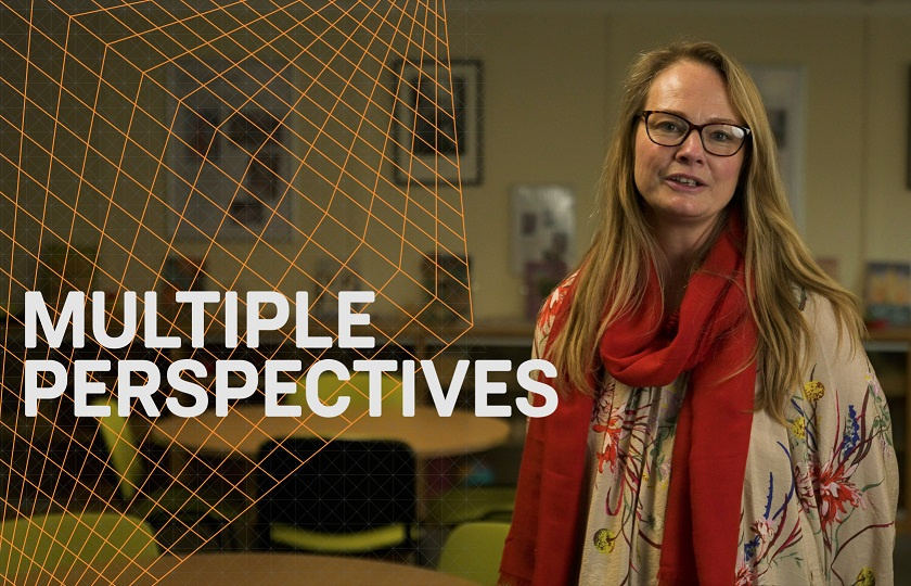 Female student on the Graduate Diploma in Adult and Further Education with a graphic saying 'Multiple Perspectives' beside her