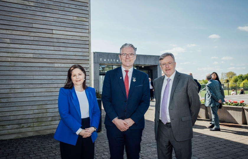 Professor Niamh Hourigan, President Jarlath Burns and Professor Eugene Wall standing outside the MIC sports complex